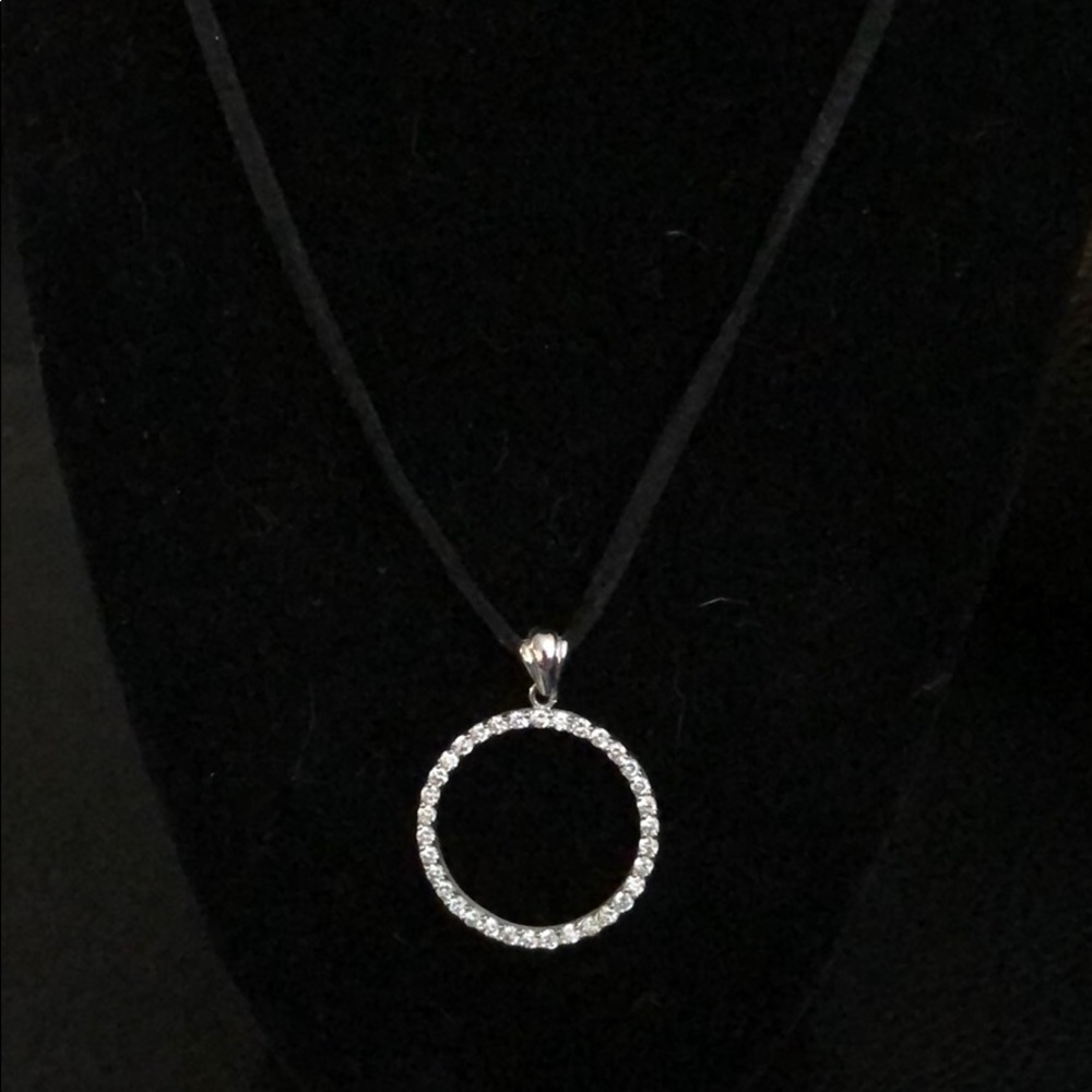 Black suede cord and sharper image pendant